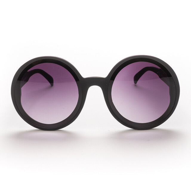 Monica OK014 zwart (paarse  lens)